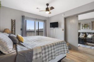 A comfortable bedroom inside a Branson, Missouri, vacation rental that's perfect for a family vacation.